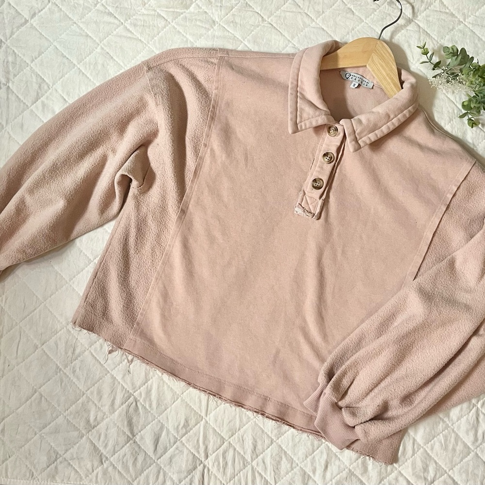 Collection by Cezele pullover with buttons and a raw hem; size small